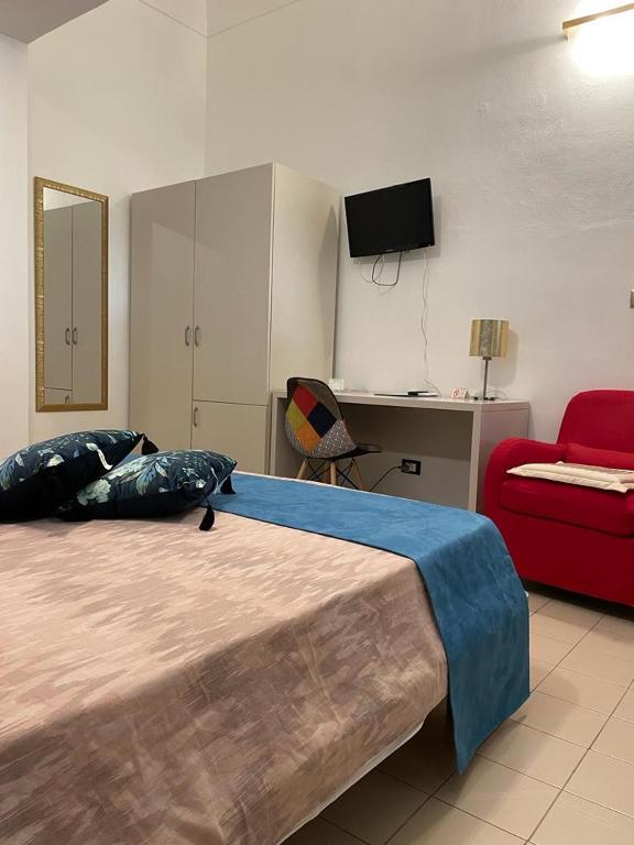 Letto o letti in una camera di Albergo Bouganville