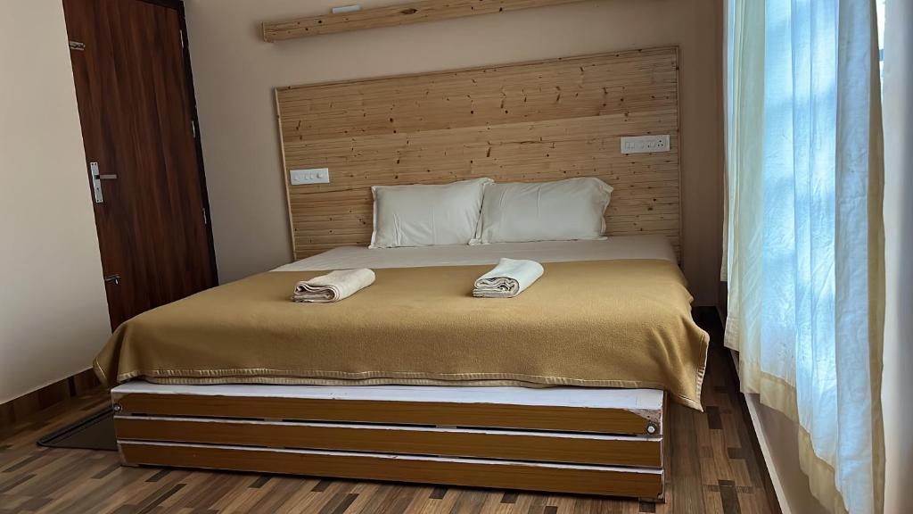 Postel nebo postele na pokoji v ubytování LAZY RETREAT
