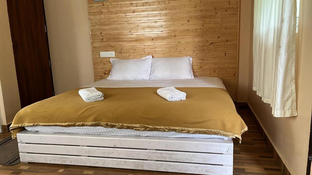 Postel nebo postele na pokoji v ubytování LAZY RETREAT