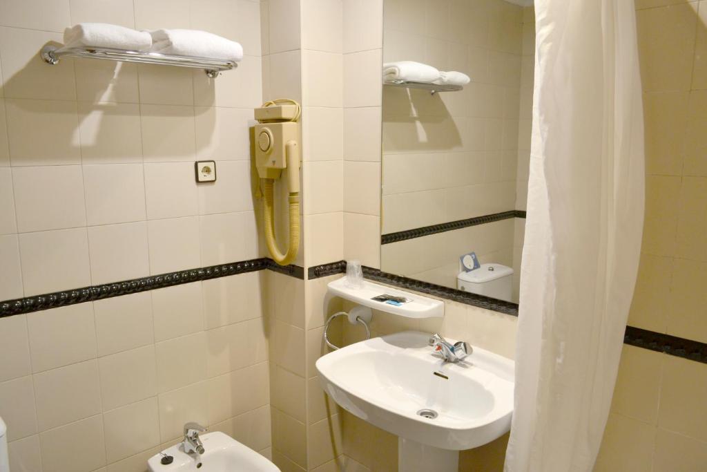 Koupelna v ubytování Hotel Alda Pasaje