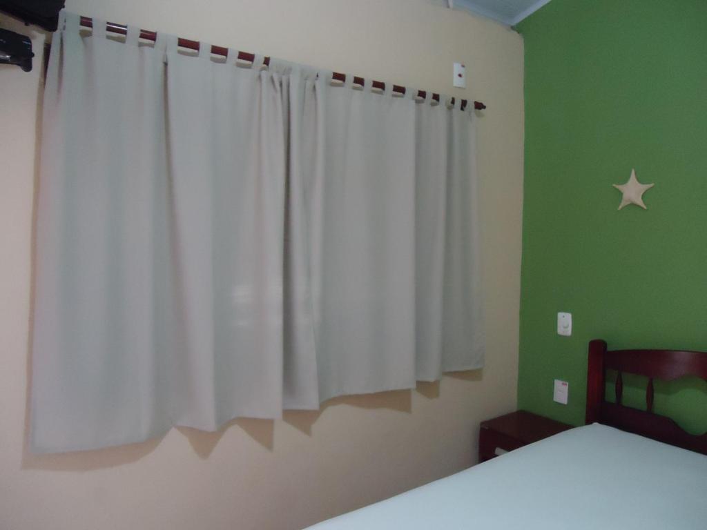 Postel nebo postele na pokoji v ubytování Pousada do Beto