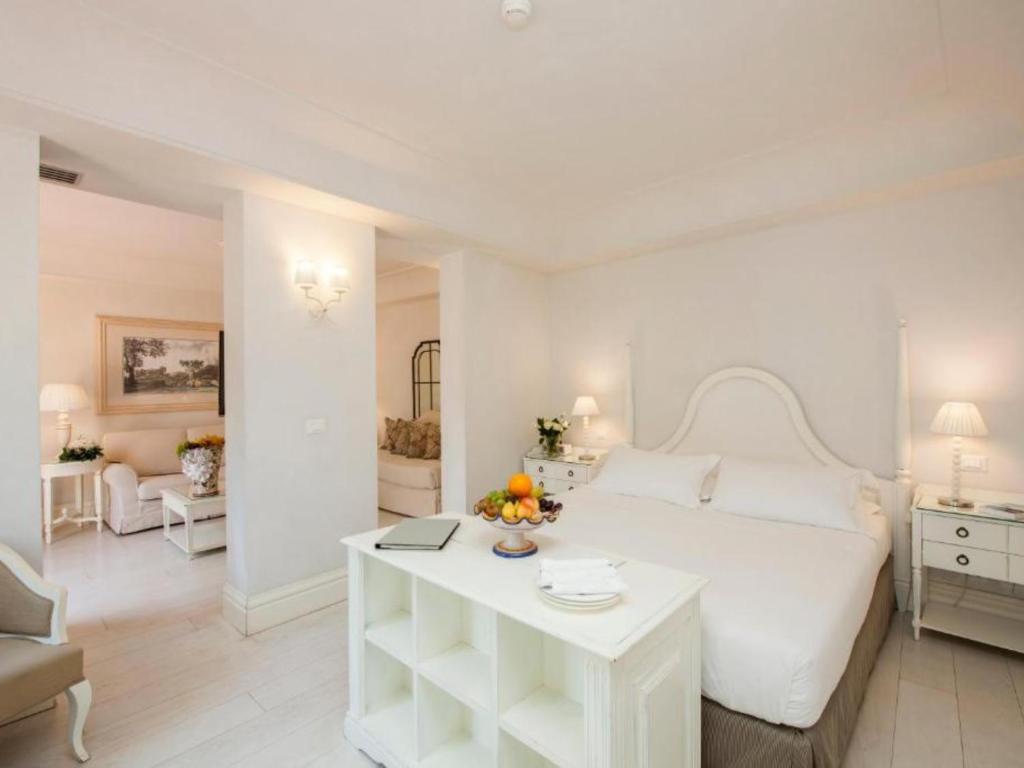 Postel nebo postele na pokoji v ubytování Villa Athena Resort