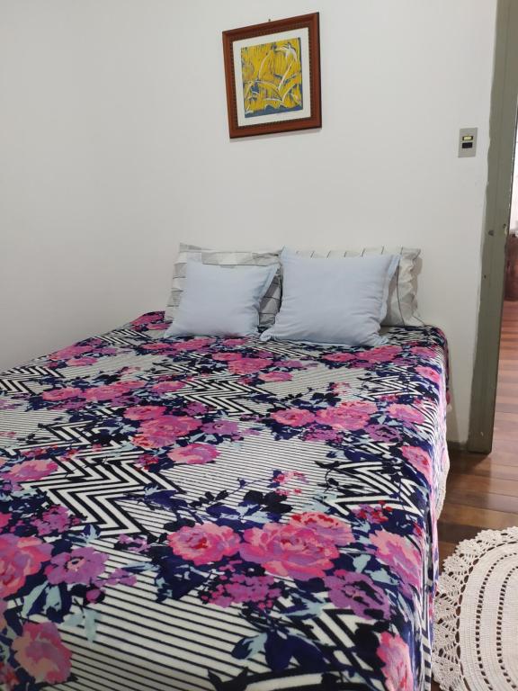 Ein Bett oder Betten in einem Zimmer der Unterkunft Pousada São Matheus próximo Serra do Rio do Rastro