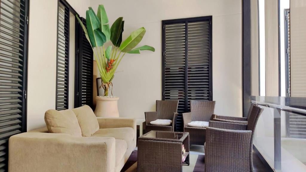 Posedenie v ubytovaní Selecta Elegante Apartamento con Patio en Centro Historico
