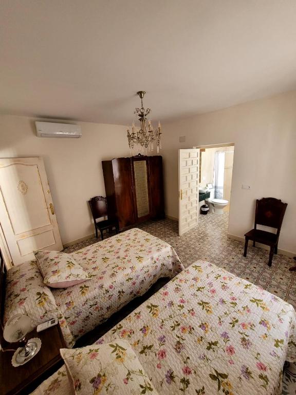 Postel nebo postele na pokoji v ubytování Casa rural La Golondrina