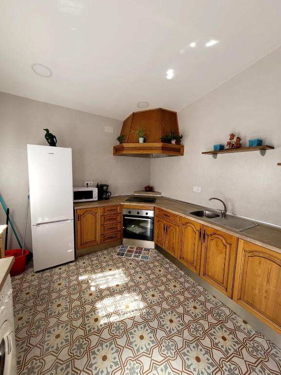Kuchyň nebo kuchyňský kout v ubytování Casa rural La Golondrina