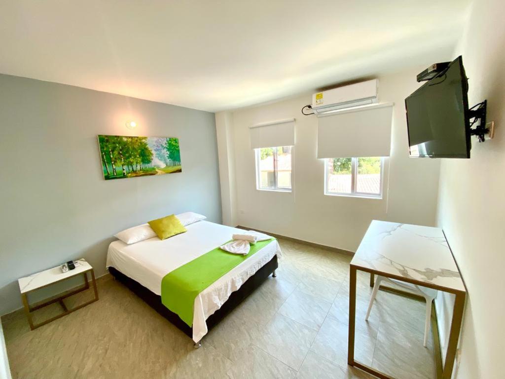 TV a/nebo společenská místnost v ubytování Biohotel Rio Claro
