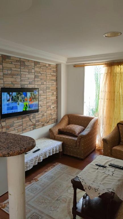 TV a/nebo společenská místnost v ubytování Tiba soliman plage