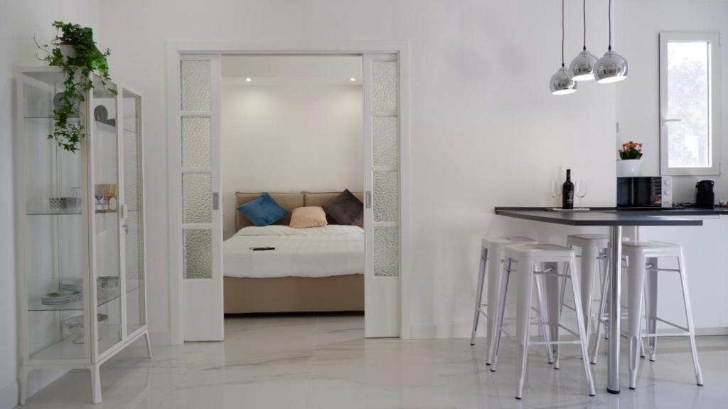 Ένα ή περισσότερα κρεβάτια σε δωμάτιο στο Apulian Home 192