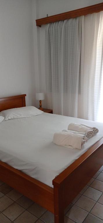 Posteľ alebo postele v izbe v ubytovaní Raptis Aparthotel Sivota