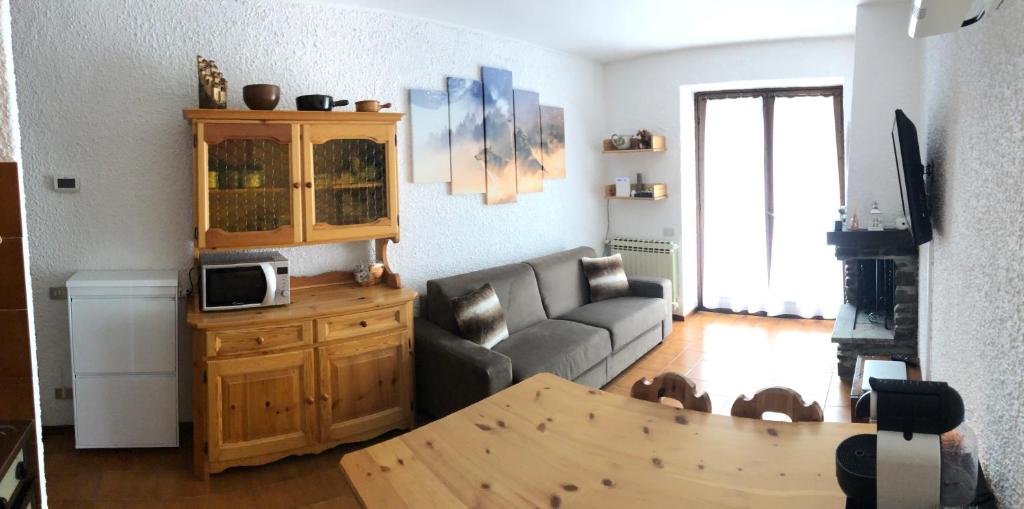 Kuchyň nebo kuchyňský kout v ubytování Appartamento Pian di Neve