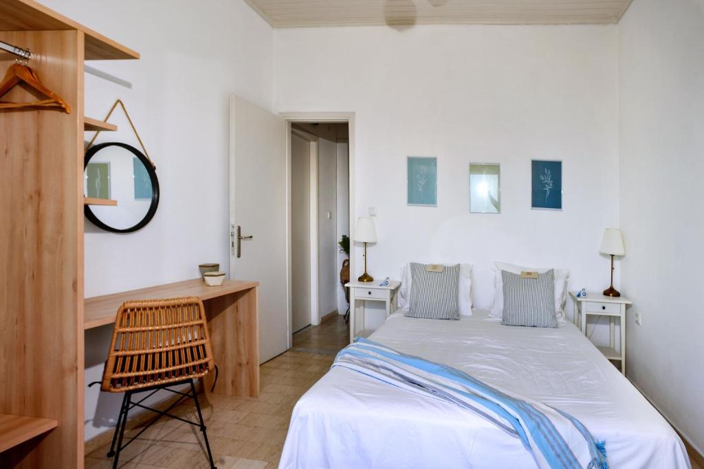 Postel nebo postele na pokoji v ubytování New! PaxosWhite Sea View Apartments & Studios!