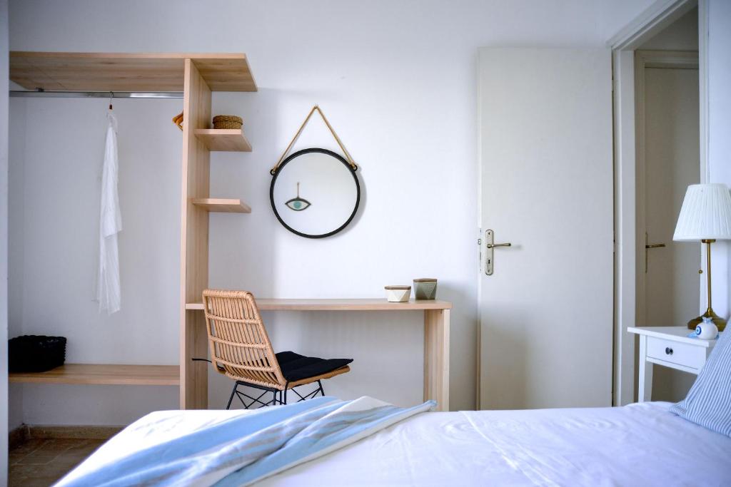 Postel nebo postele na pokoji v ubytování New! PaxosWhite Sea View Apartments & Studios!