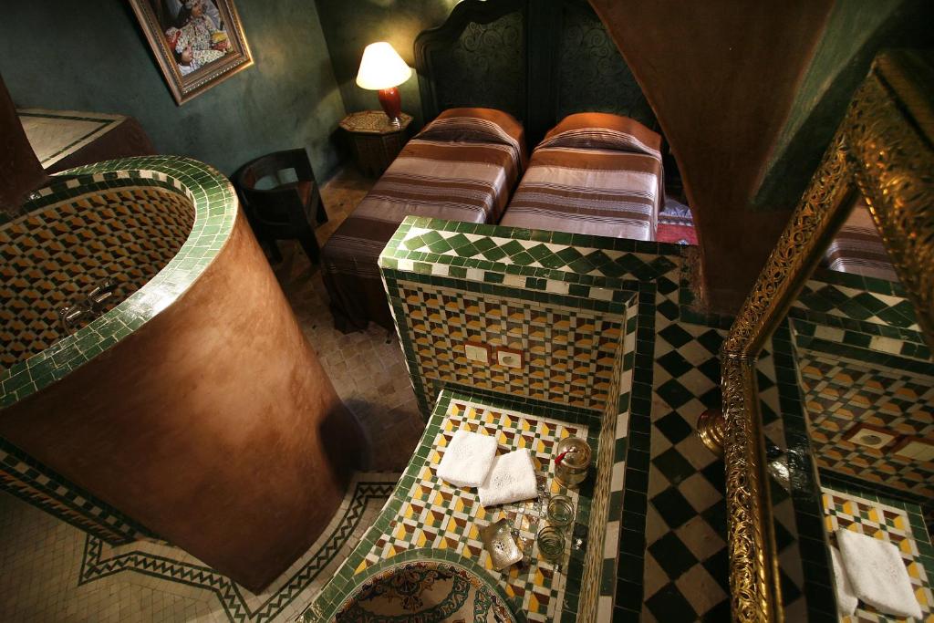 Postel nebo postele na pokoji v ubytování Riad Moullaoud