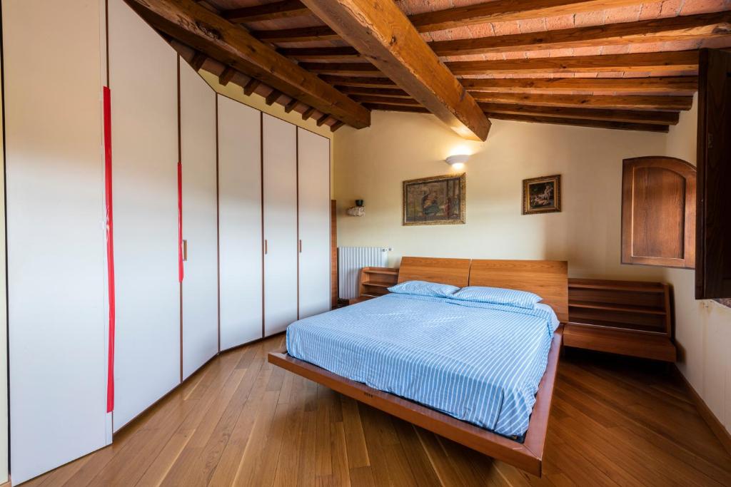 Łóżko lub łóżka w pokoju w obiekcie Villa Soiana by Mmega