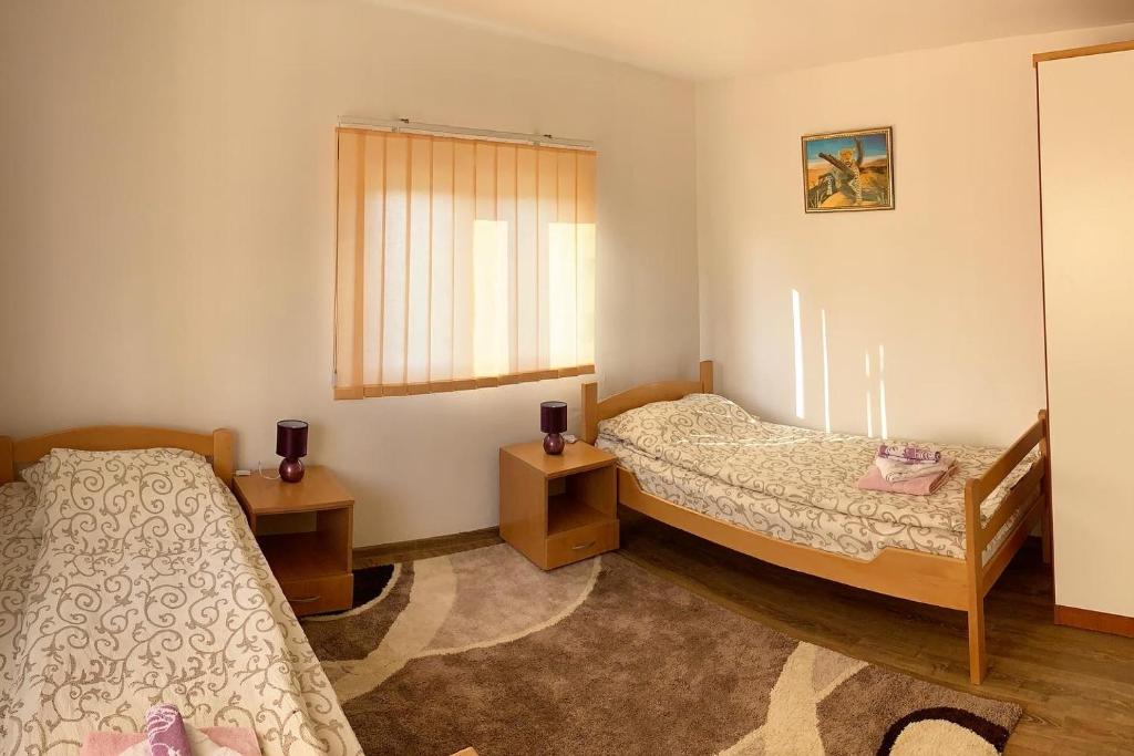 Postel nebo postele na pokoji v ubytování Konak kod munje