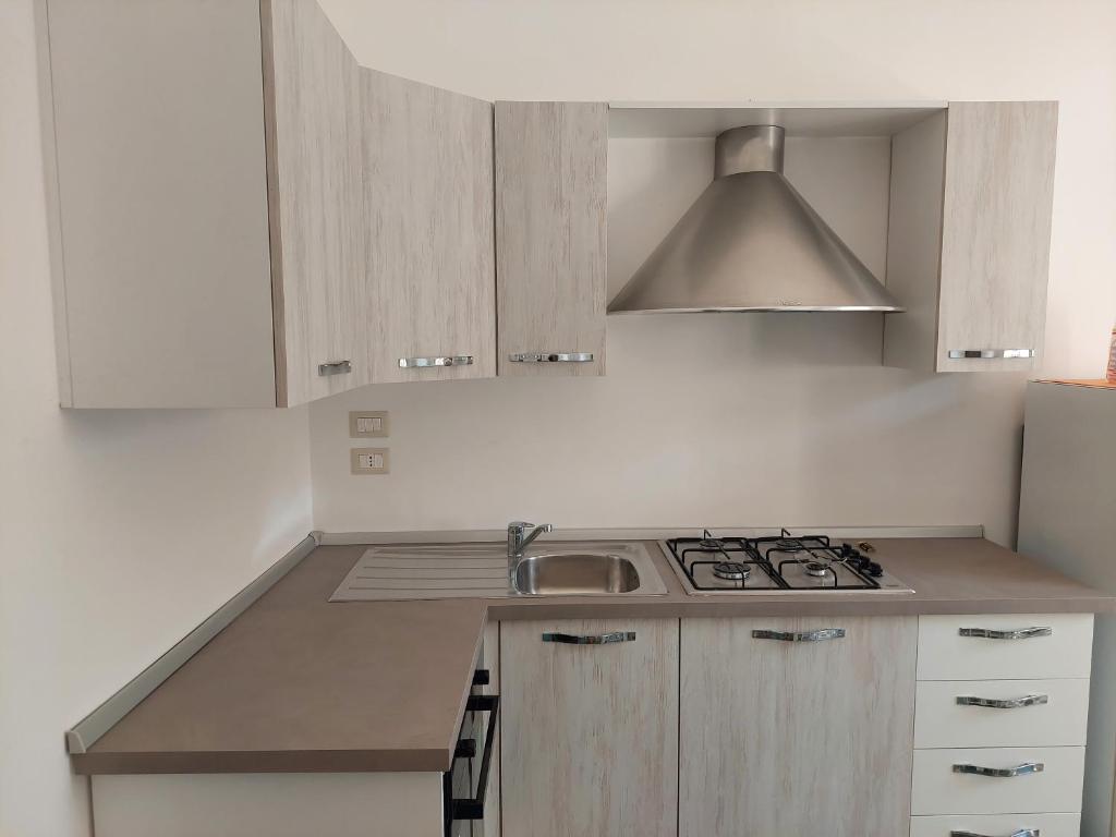 A kitchen or kitchenette at Casa Vacanze Lu Trappitu