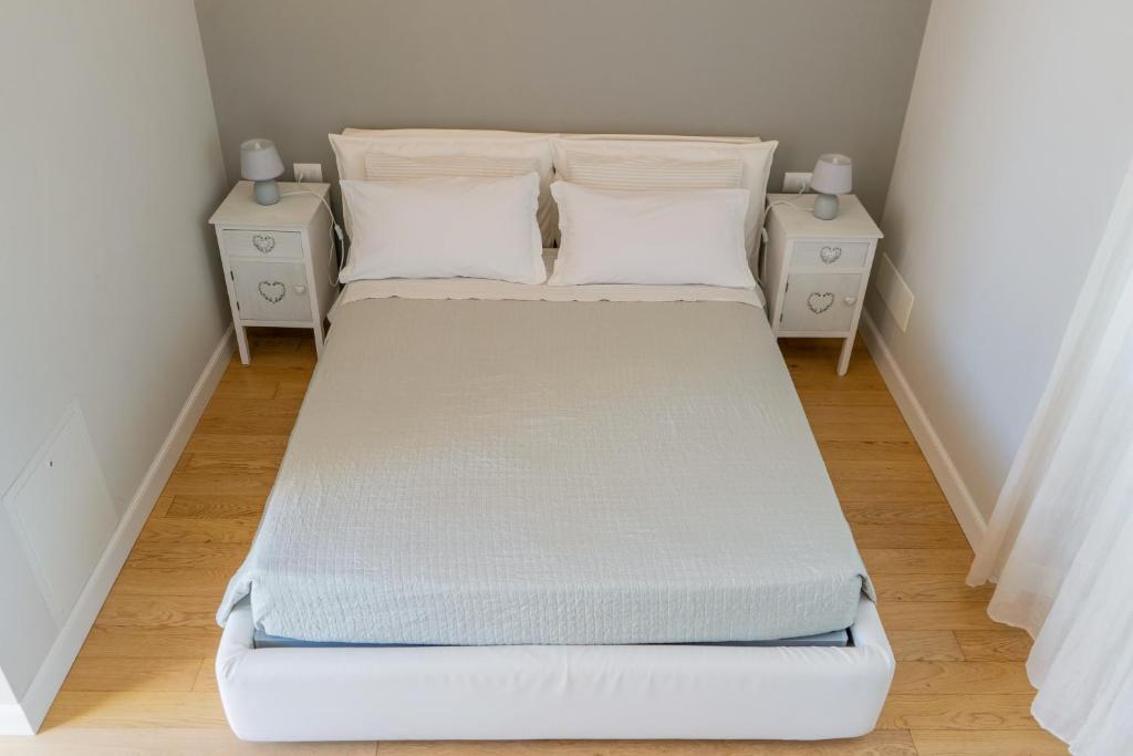 Un pat sau paturi într-o cameră la B&B Margante
