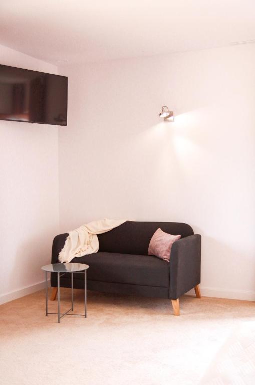 Posedenie v ubytovaní Apartament Ósemka