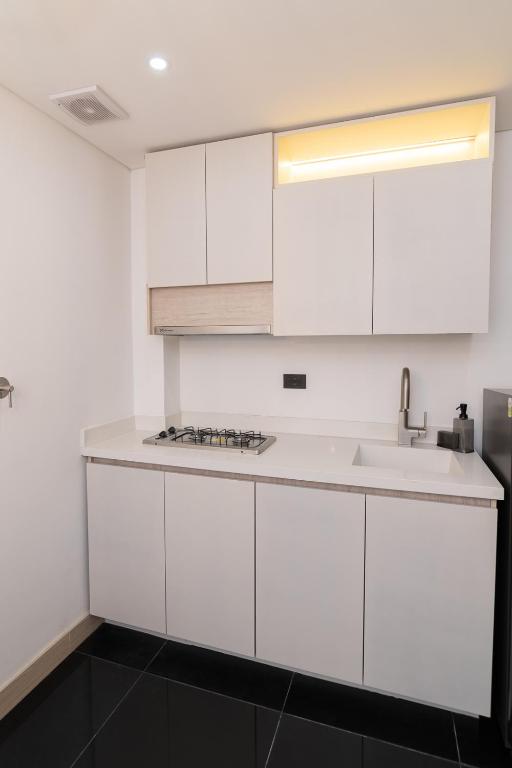 Kuchyň nebo kuchyňský kout v ubytování Hotel Zona A