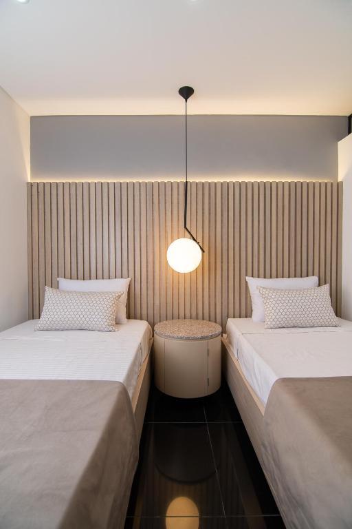 Postel nebo postele na pokoji v ubytování Hotel Zona A