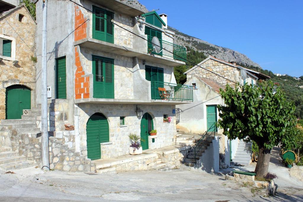 Fotografia z galérie ubytovania Holiday house with a swimming pool Makarska - 6668 v destinácii Makarska