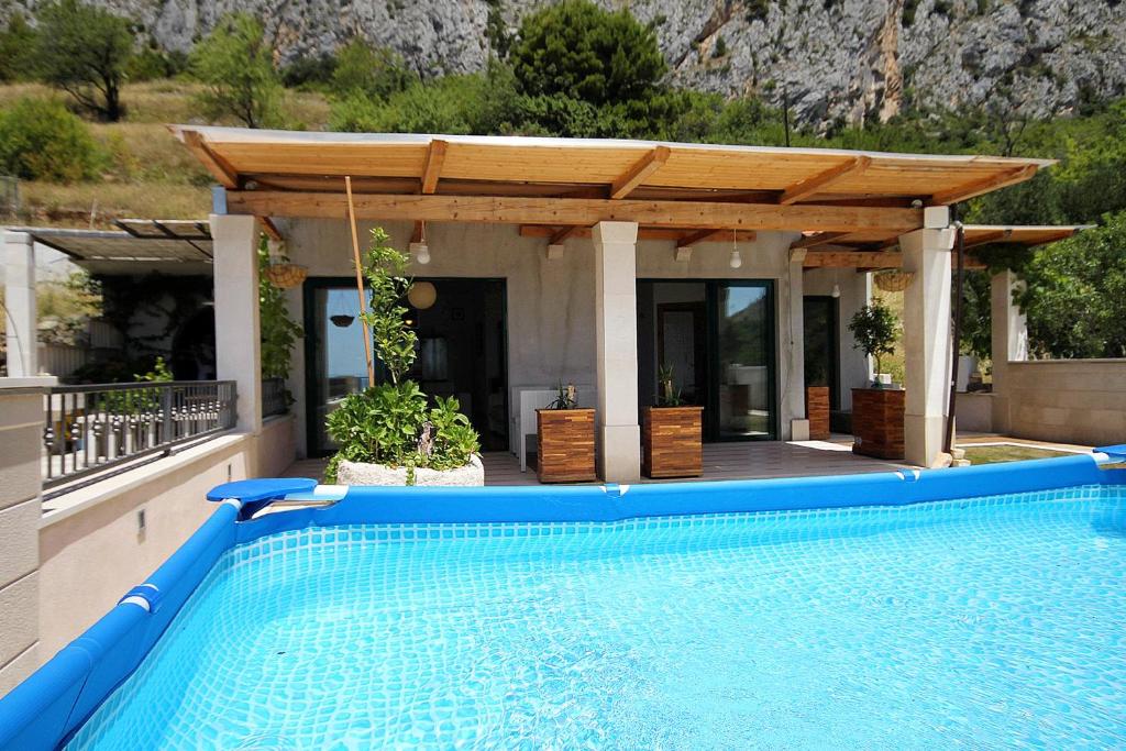 Fotografia z galérie ubytovania Holiday house with a swimming pool Kotisina, Makarska - 6808 v destinácii Makarska