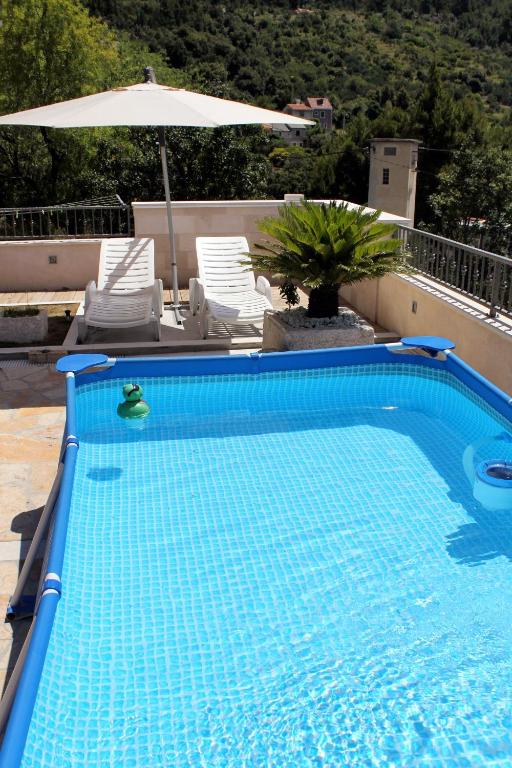 Fotografia z galérie ubytovania Holiday house with a swimming pool Kotisina, Makarska - 6808 v destinácii Makarska