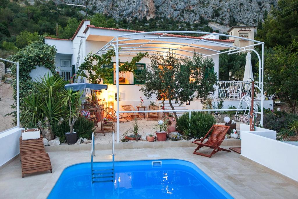 Fotografia z galérie ubytovania Family friendly house with a swimming pool Kotisina, Makarska - 6809 v destinácii Makarska