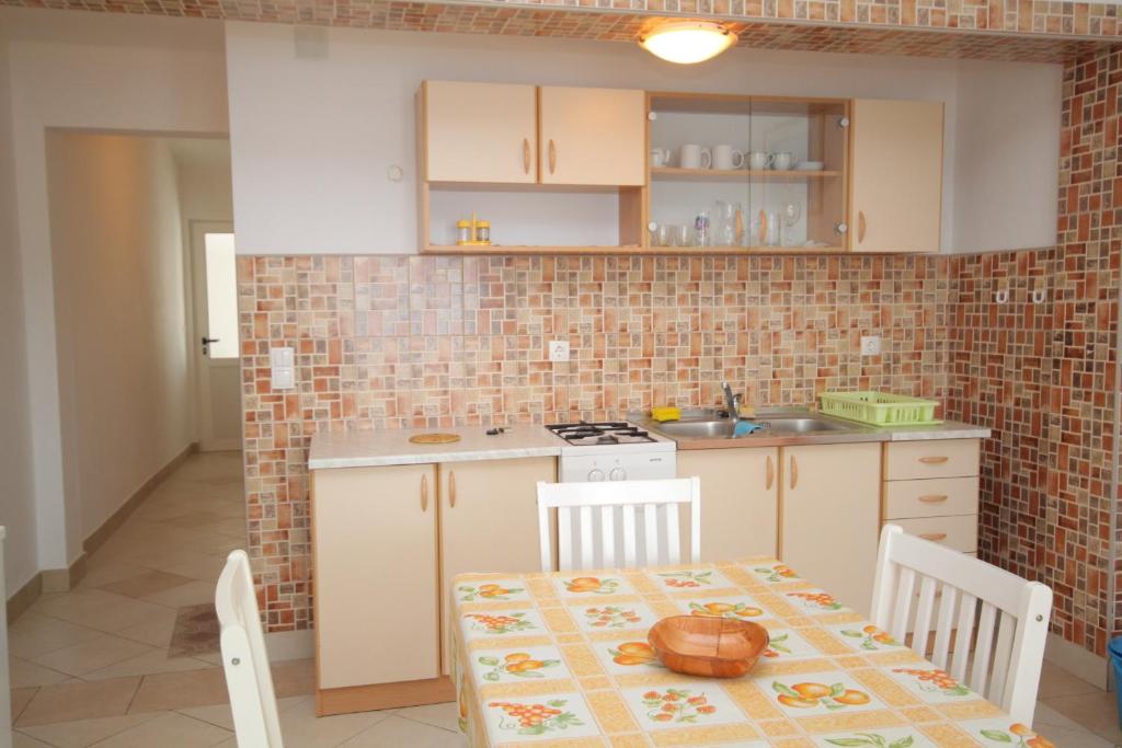 Fotografia z galérie ubytovania Apartments by the sea Metajna, Pag - 6466 v destinácii Zubovići