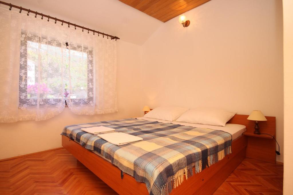 Fotografia z galérie ubytovania Apartments and rooms with parking space Podgora, Makarska - 6790 v Podgore