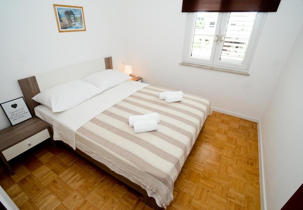 Posteľ alebo postele v izbe v ubytovaní Apartments with a parking space Sukosan, Zadar - 6131