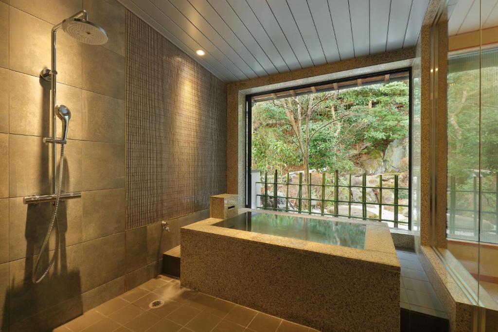 Koupelna v ubytování Arima Onsen Taketoritei Maruyama