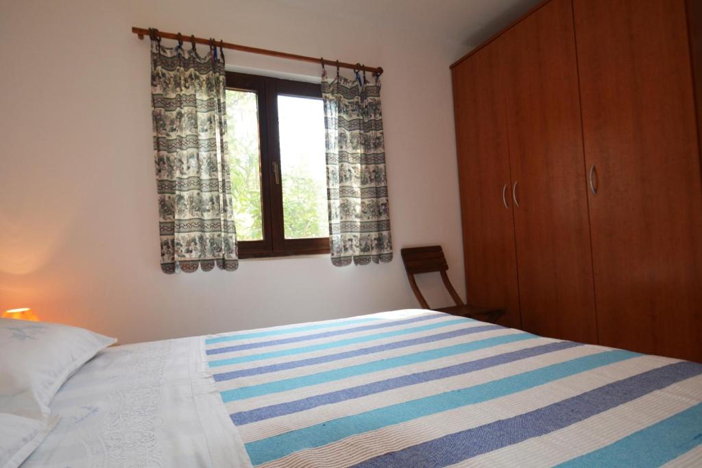 Posteľ alebo postele v izbe v ubytovaní Apartment Zaglav 8170b