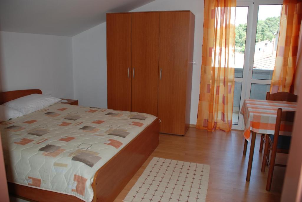 Posteľ alebo postele v izbe v ubytovaní Apartments by the sea Kukljica, Ugljan - 8478