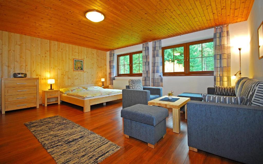 Postel nebo postele na pokoji v ubytování Apartmány a štúdiá Miroslav