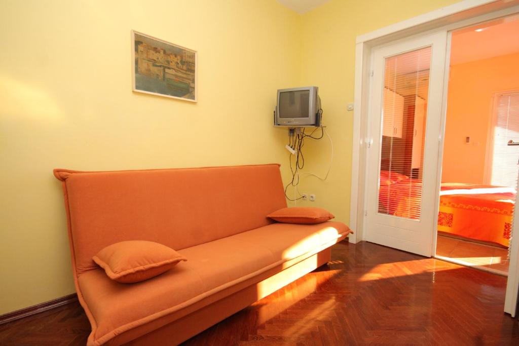 Televízia a/alebo spoločenská miestnosť v ubytovaní Apartments by the sea Kukljica, Ugljan - 8253
