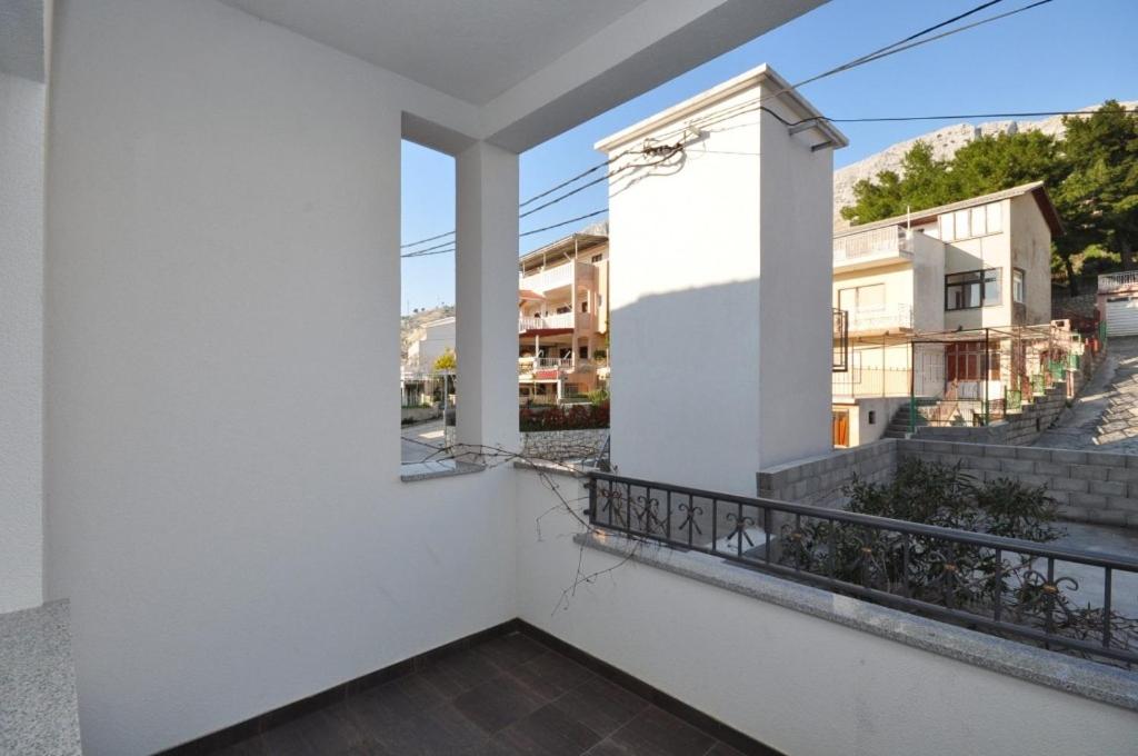 Fotografia z galérie ubytovania Apartments by the sea Duce, Omis - 8633 v Omise