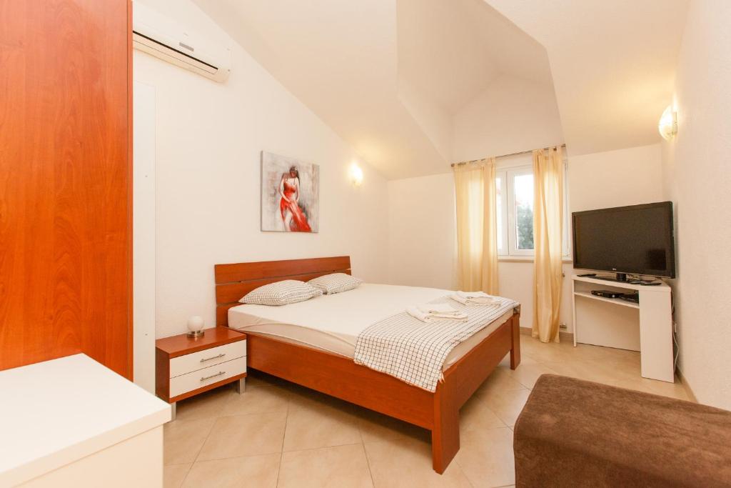 Fotografia z galérie ubytovania Family friendly apartments with a swimming pool Okrug Gornji, Ciovo - 8626 v Trogiri