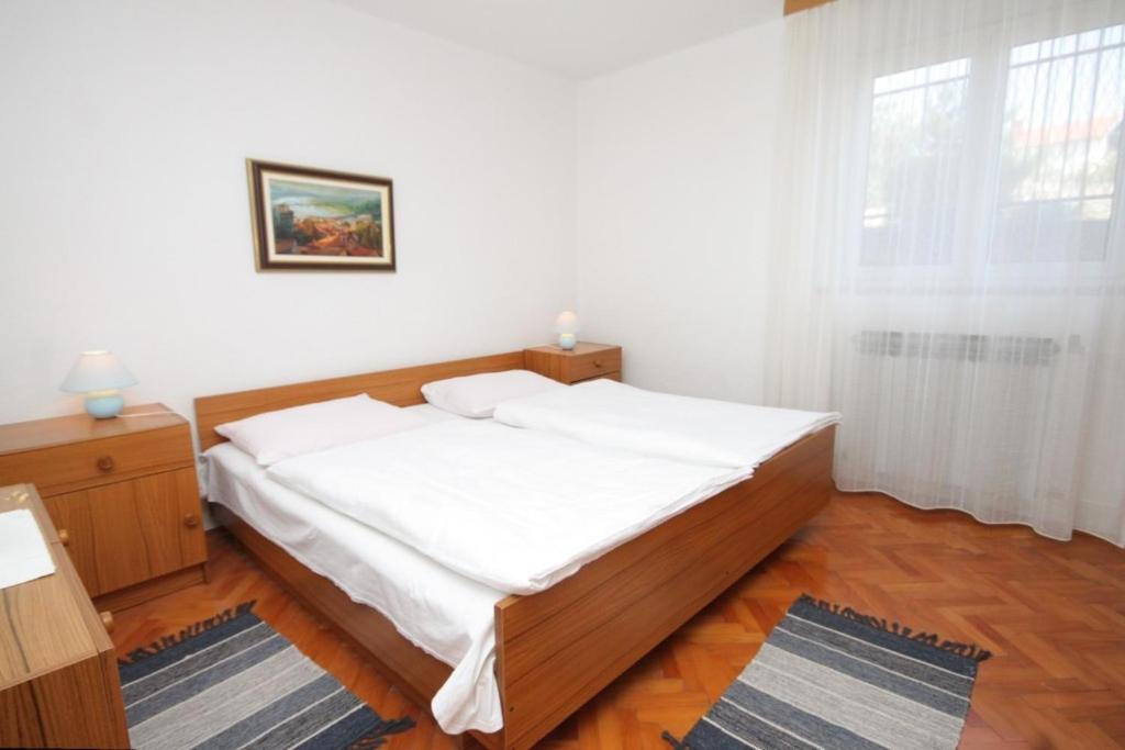Posteľ alebo postele v izbe v ubytovaní Apartments by the sea Kukljica, Ugljan - 8451