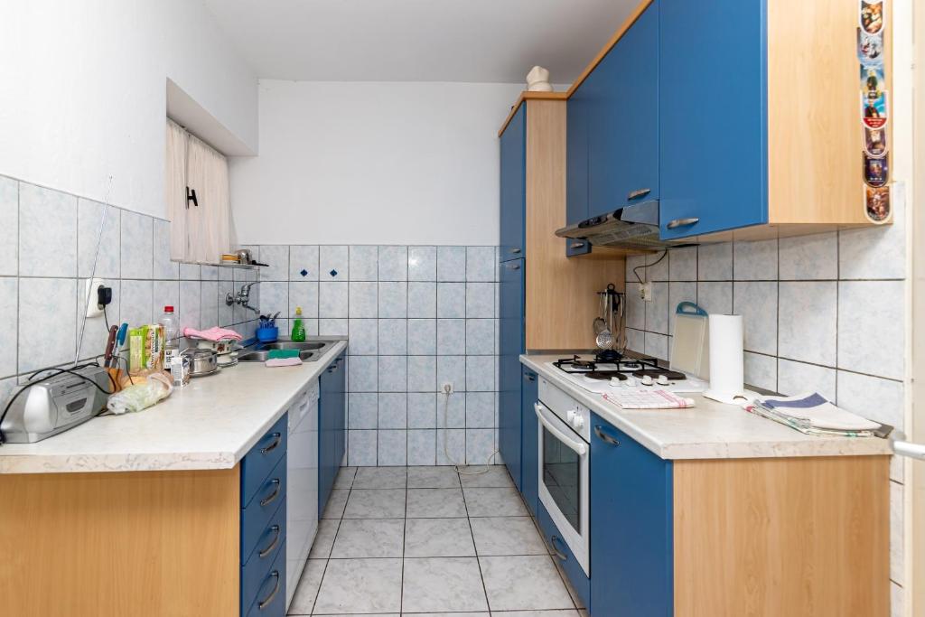 Kuchyň nebo kuchyňský kout v ubytování Apartment Supetar 11278a