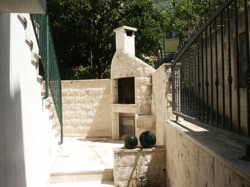 Fotografia z galérie ubytovania Apartments by the sea Podgora, Makarska - 11335 v Podgore