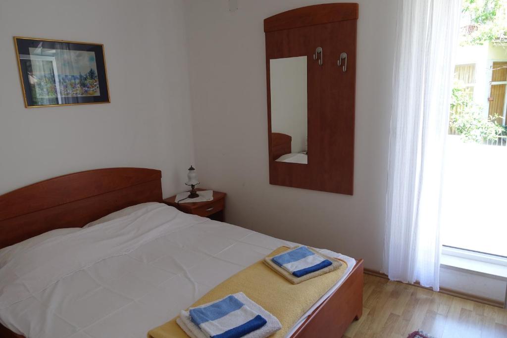 Posteľ alebo postele v izbe v ubytovaní Apartments by the sea Podgora, Makarska - 11335