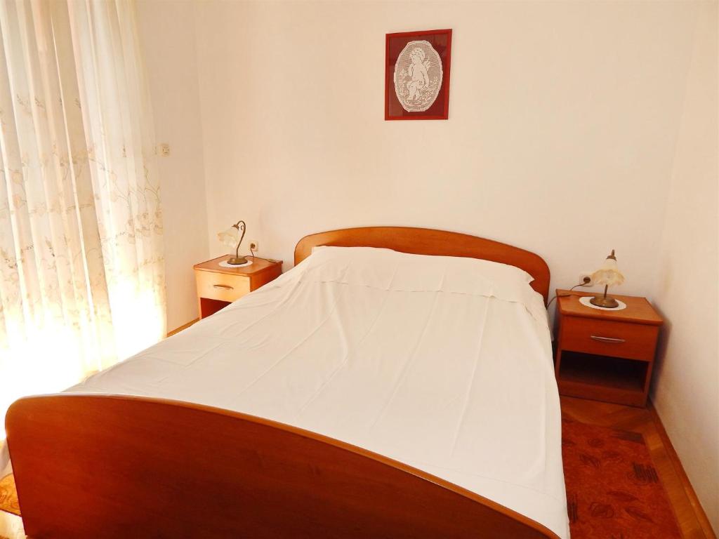 Posteľ alebo postele v izbe v ubytovaní Apartment Pag 11358e