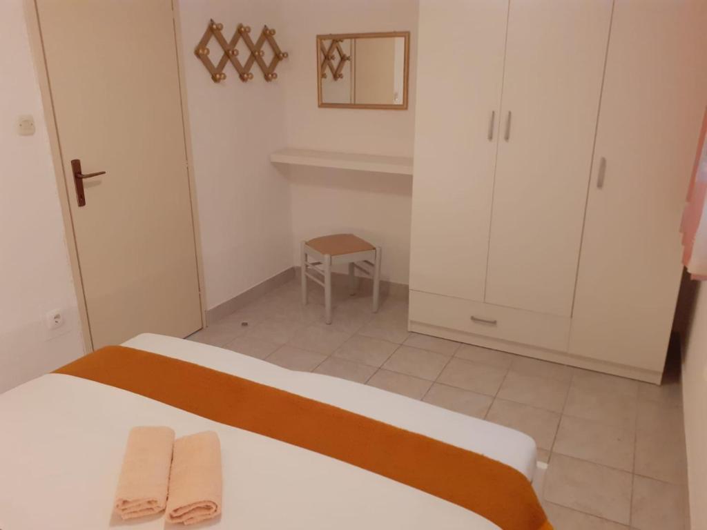 Posteľ alebo postele v izbe v ubytovaní Apartment Gradac 11332a