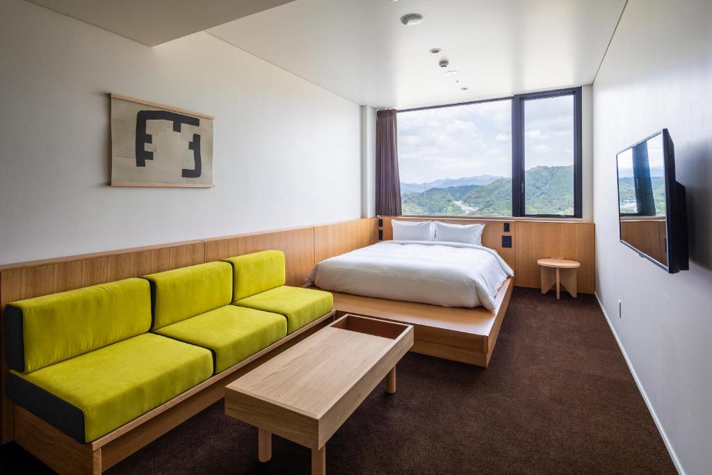 TV a/nebo společenská místnost v ubytování Hotel Vison
