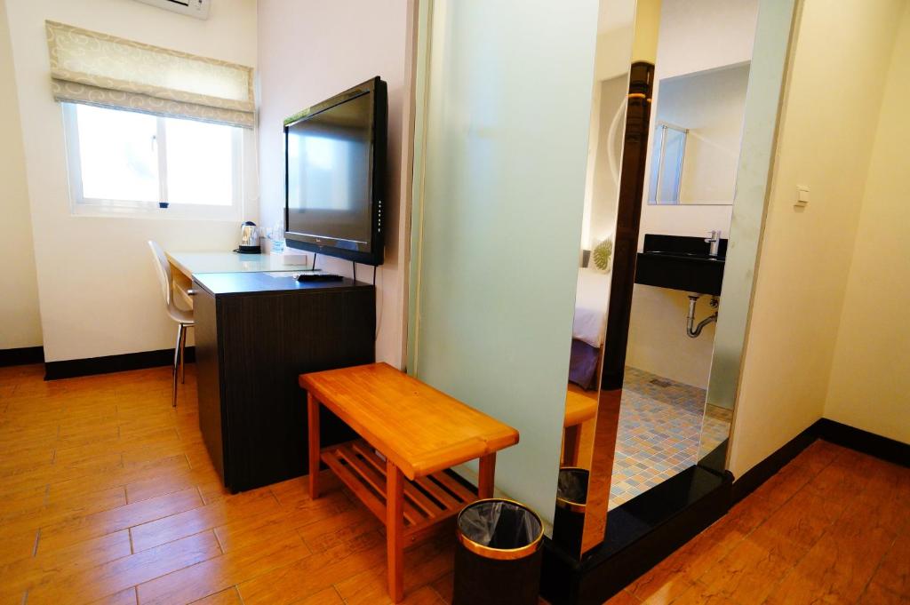 TV a/nebo společenská místnost v ubytování Green Yard B&B