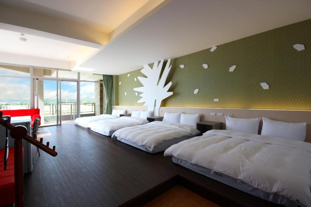 Postel nebo postele na pokoji v ubytování Green Yard B&B