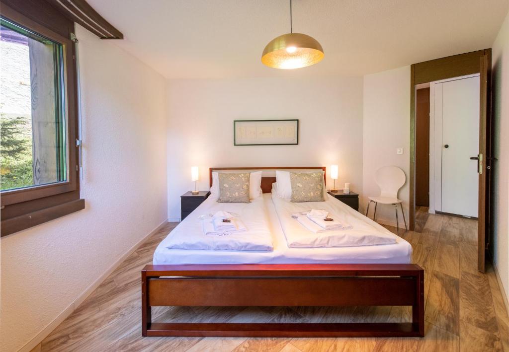 Postel nebo postele na pokoji v ubytování Chalet Petunia
