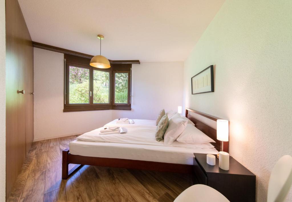 Postel nebo postele na pokoji v ubytování Chalet Petunia